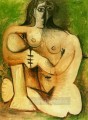 緑の背景にしゃがむ裸の女性 1960 パブロ・ピカソ